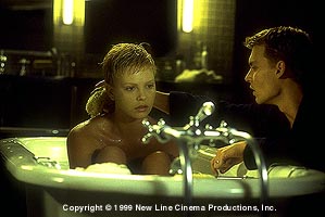 Movie still photograph, Charlize Theron and Johnny Depp in The Astronaut's Wife, Festivale film reviews section