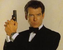 Movie still photograph, Pierce Brosnan as James Bond in The World is Not Enough, Festivale film reviews section