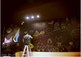 Enjoy Su blackboard art in progress, photograph courtesy of the artist; 270x191