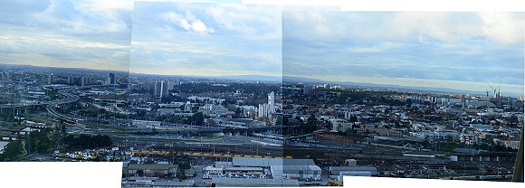 Melbourne panorama from Docklands looking towards ranges (c) 2014 Richard Hryckiewicz; 580x208